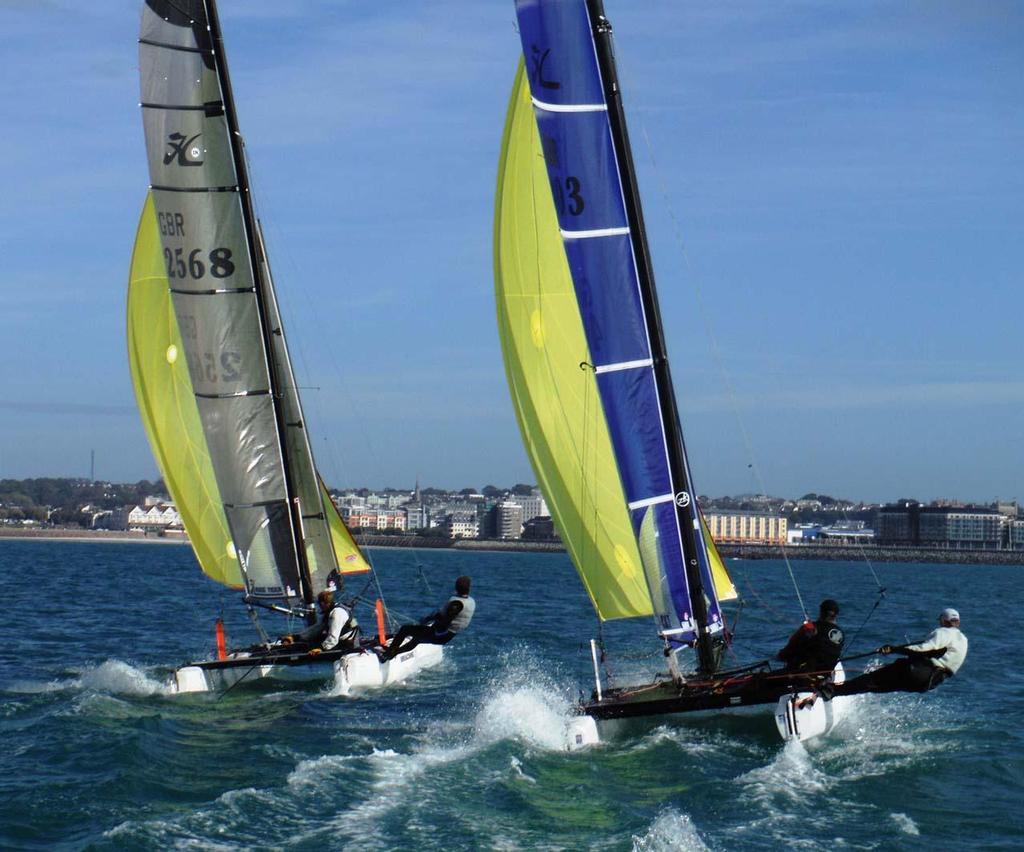 Breaching 69 (Hart and Kinross) and GBR403 (Stower and Monks) © Bill Harris http://www.shyc.je/Jersey-Regatta//